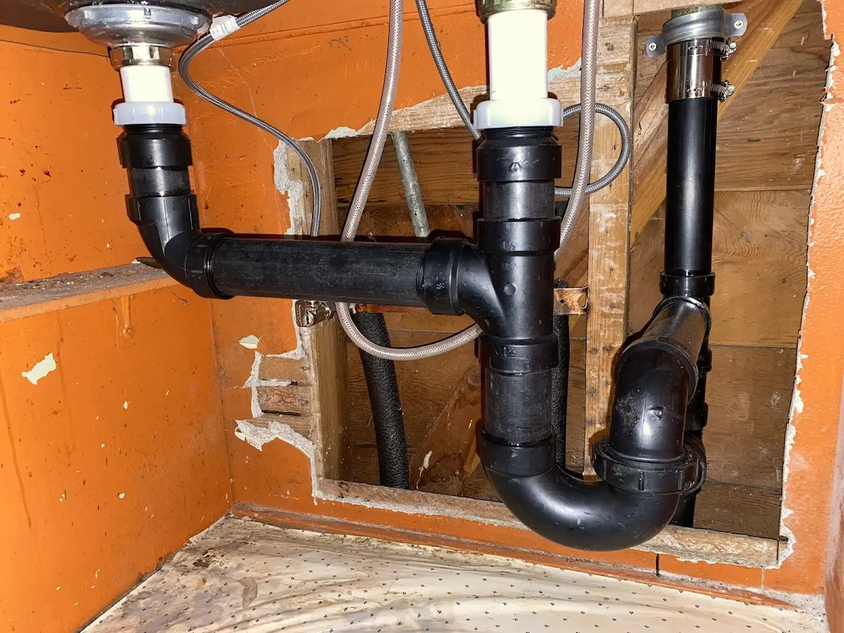 Professional Garbage Disposal Repair equipment and tools on the job in Sunbury